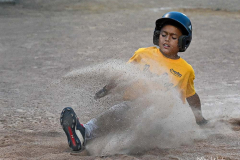 Jonny slides home for a score in a Lyndon River Dogs fall game against the Bulls on 9/13/22.

The River Dogs won 19-0.